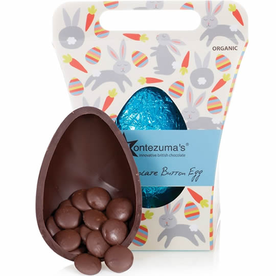 Buy Montezuma’s Dark Chocolate Button Easter Egg from montezumas Montezuma's Dark Chocolate Button Easter Egg, egg in box and half egg with buttons.