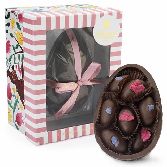 Charbonnel et Walker English Rose & Violet Dark Chocolate Easter Egg 225g, boxed and half an egg showing the chocolates inside.